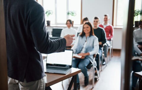 cheerful-mood-group-people-business-conference-modern-classroom-daytime